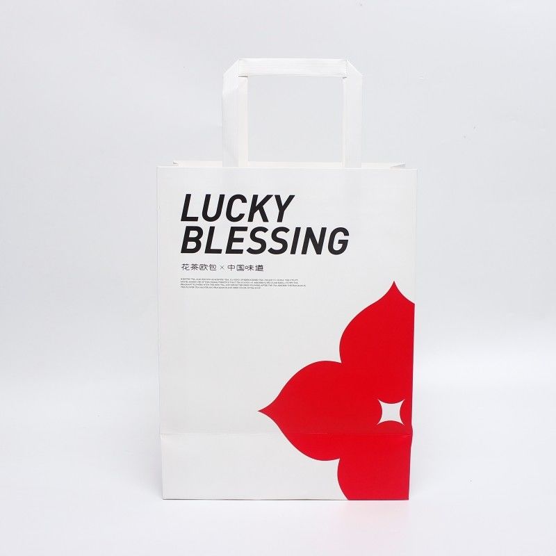 Bolsas de compras de lujo pequeñas recicladas Bolsas de papel regalo con nombre comercial para joyería Embalaje con mango